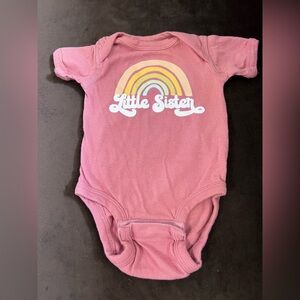 Newborn Little Sister Pink bodysuit with snap closure at bottom